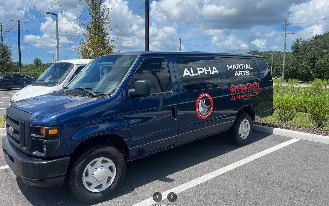 Alpha Martial Arts pickup van